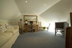upstairs living space, office or kids den