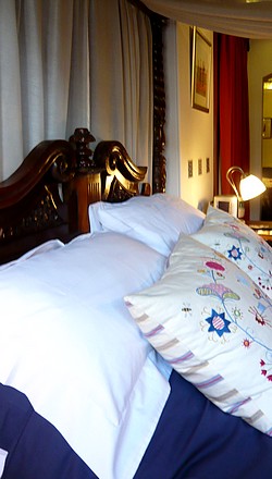 Relaxing Comfort of the Four Poster Bed.